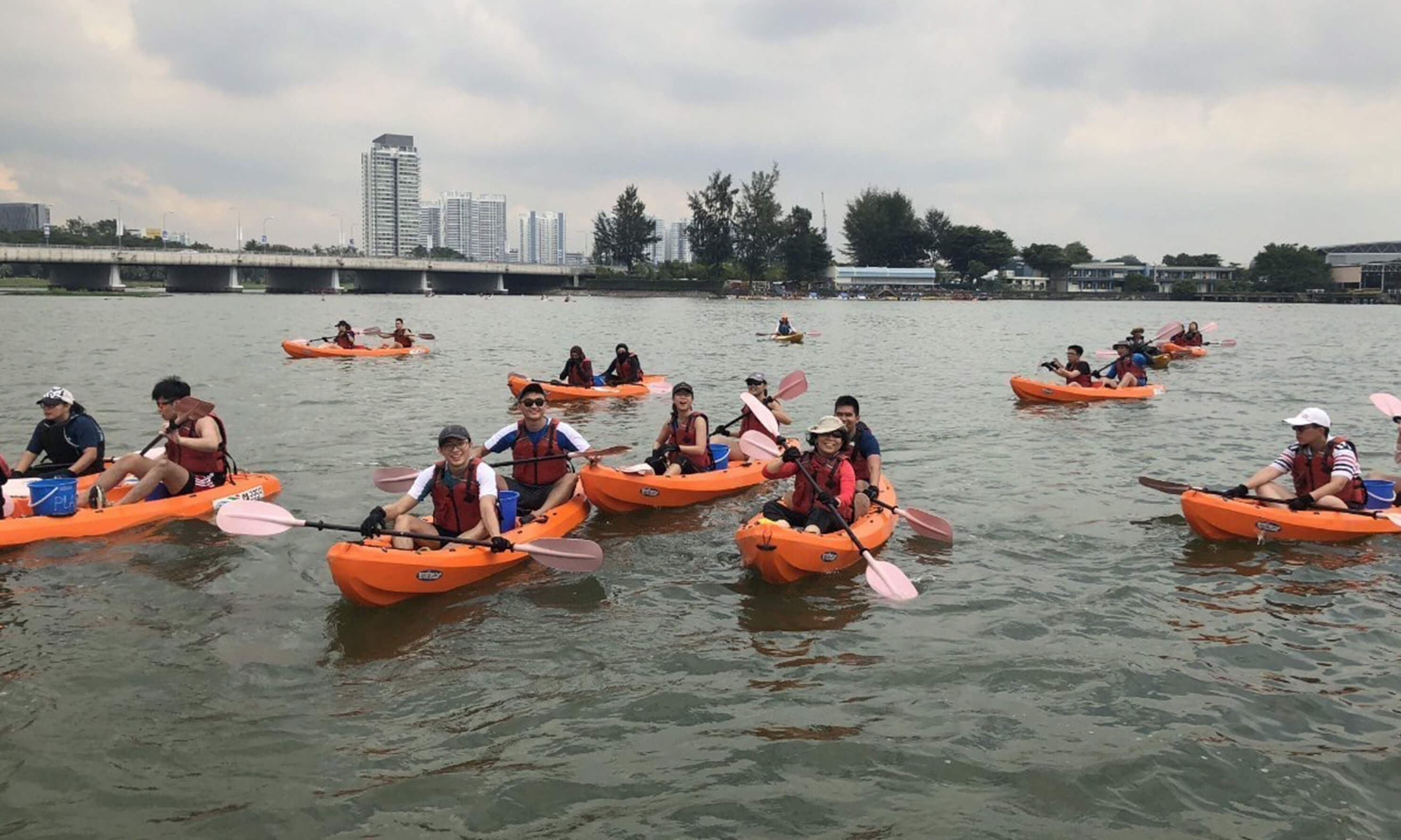 A group of people kayaking in Singapore