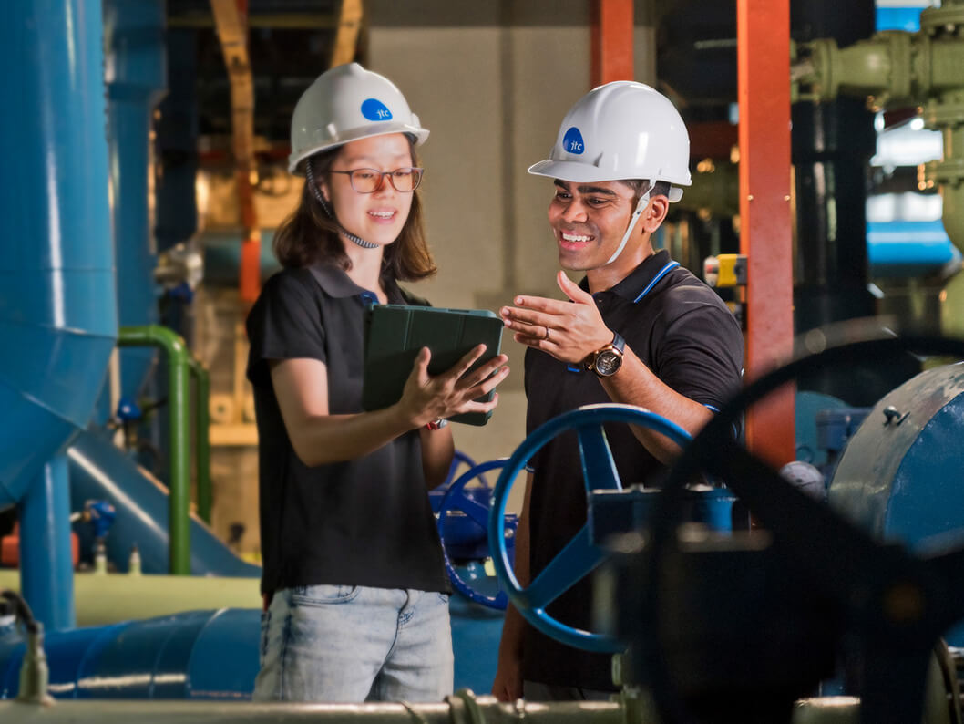 A worker in a hard hat on site