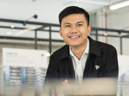 Man with a building model