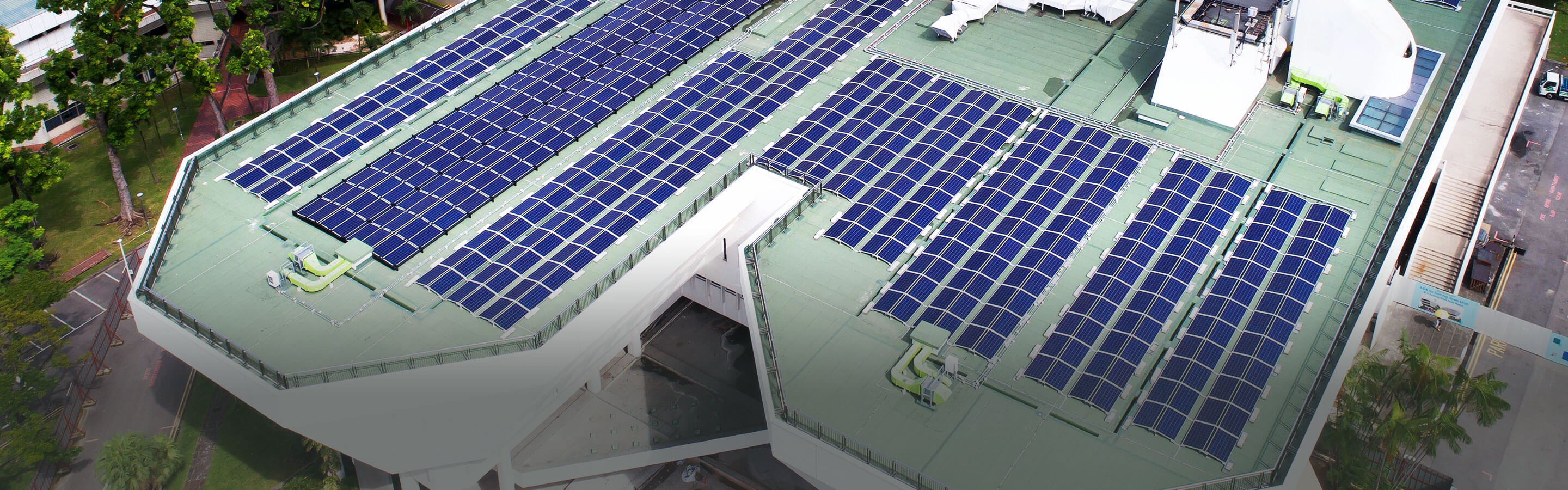 Solar panels generating solar energy on a roof of a green building