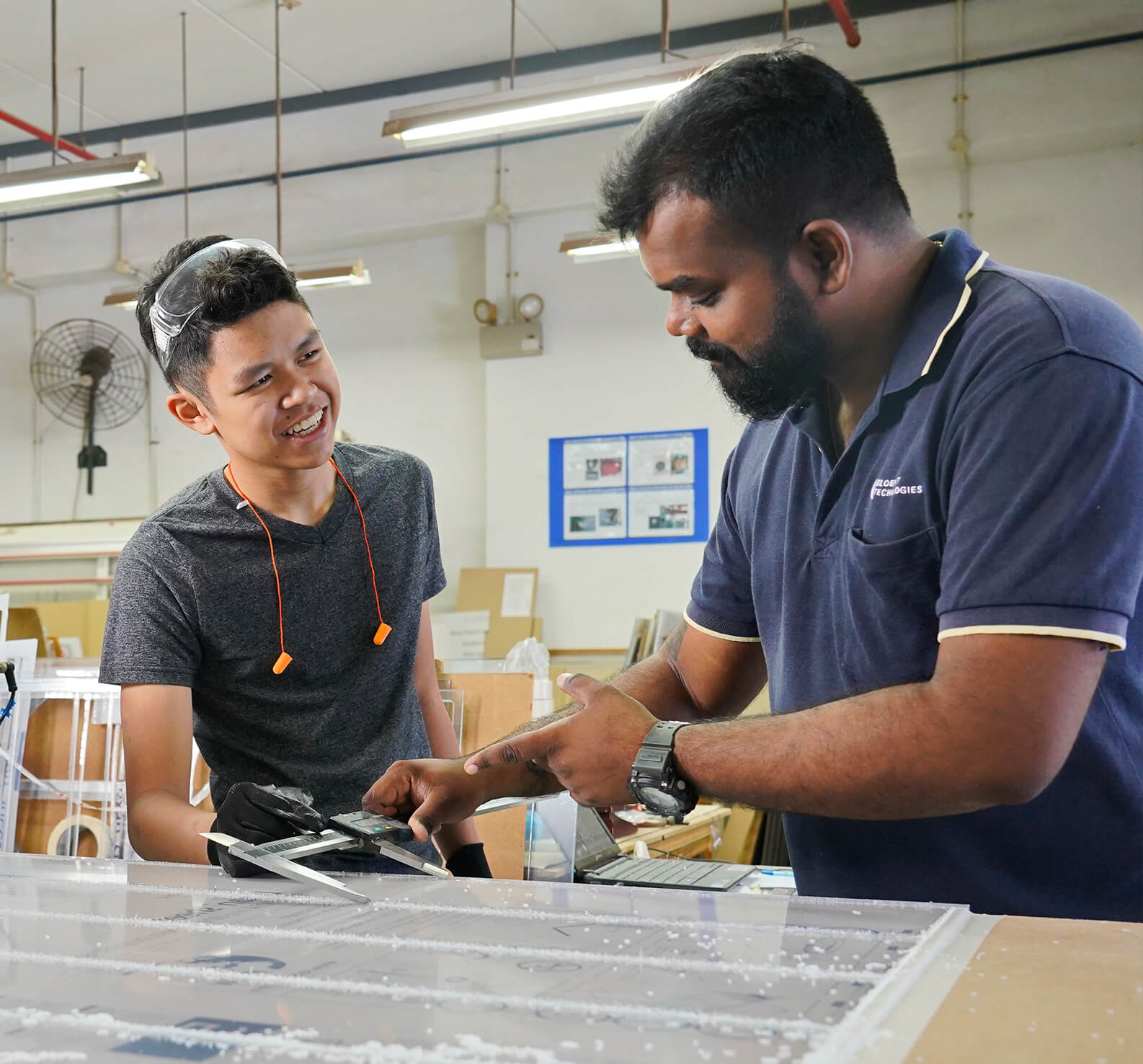 An ITE student interning at a manufacturing company