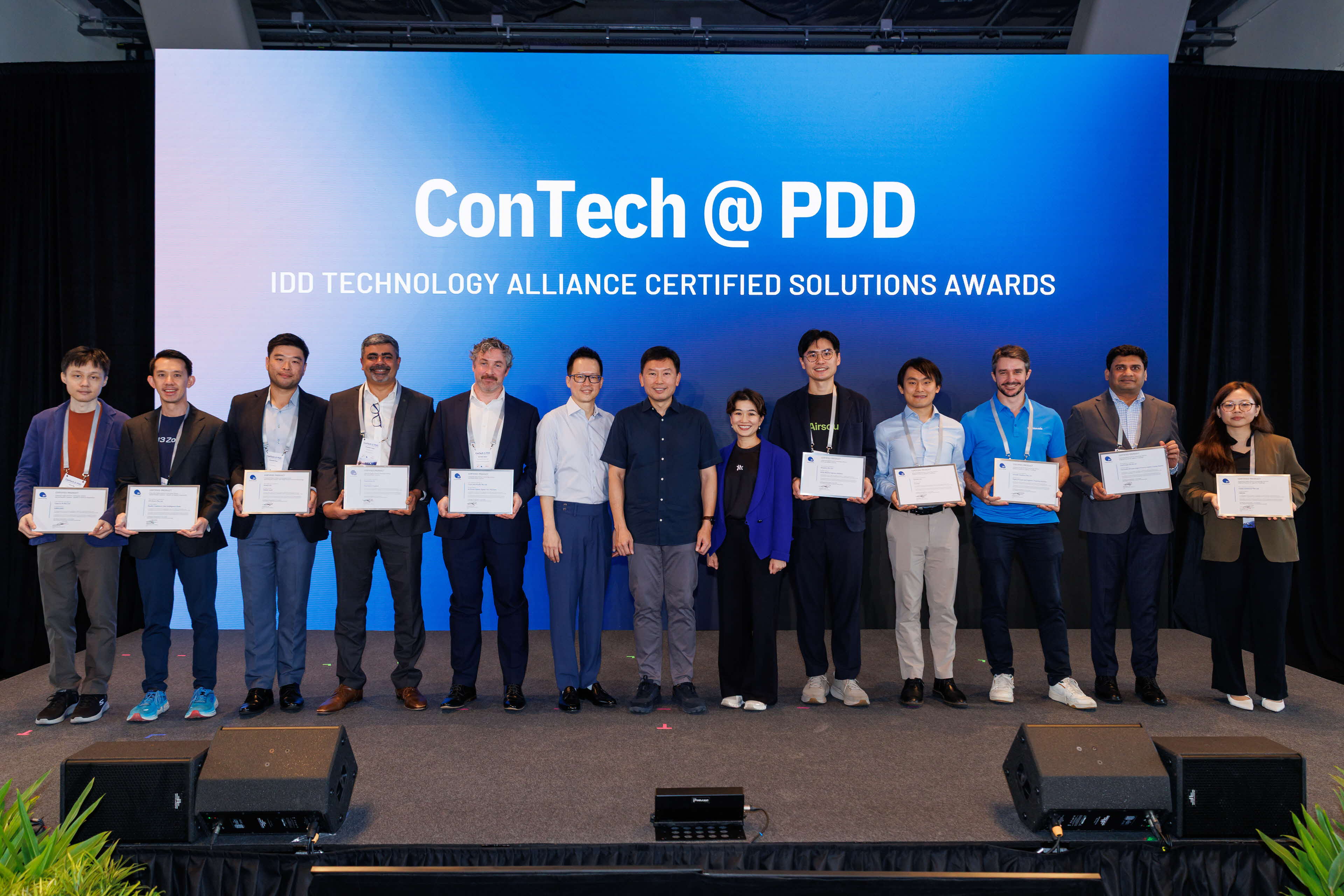 Awardees standing in a line for IDDTA certification