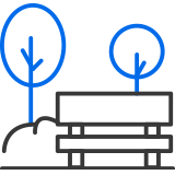Park bench and tree icon to represent lush greenery
