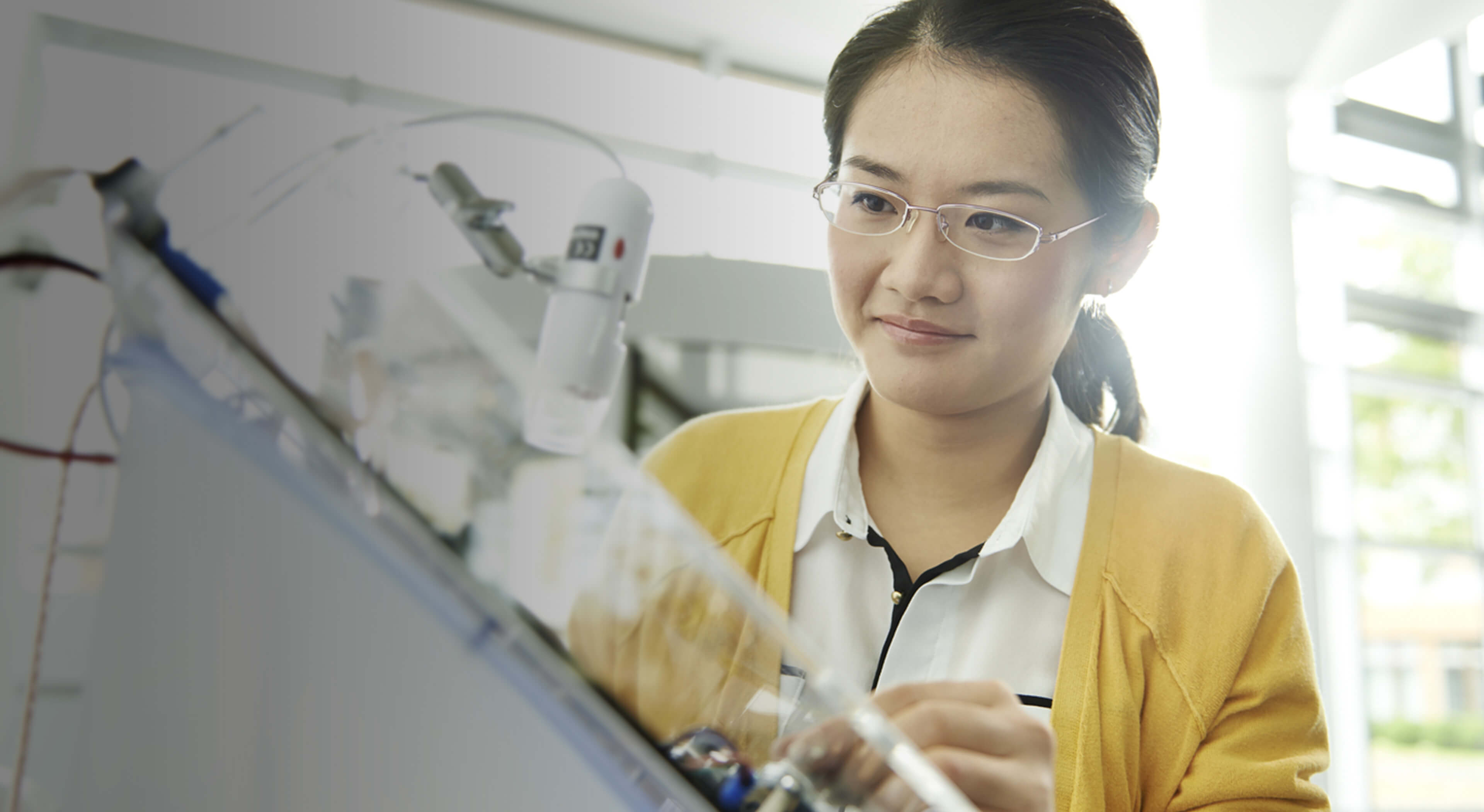 Employee working with wires and circuitry 