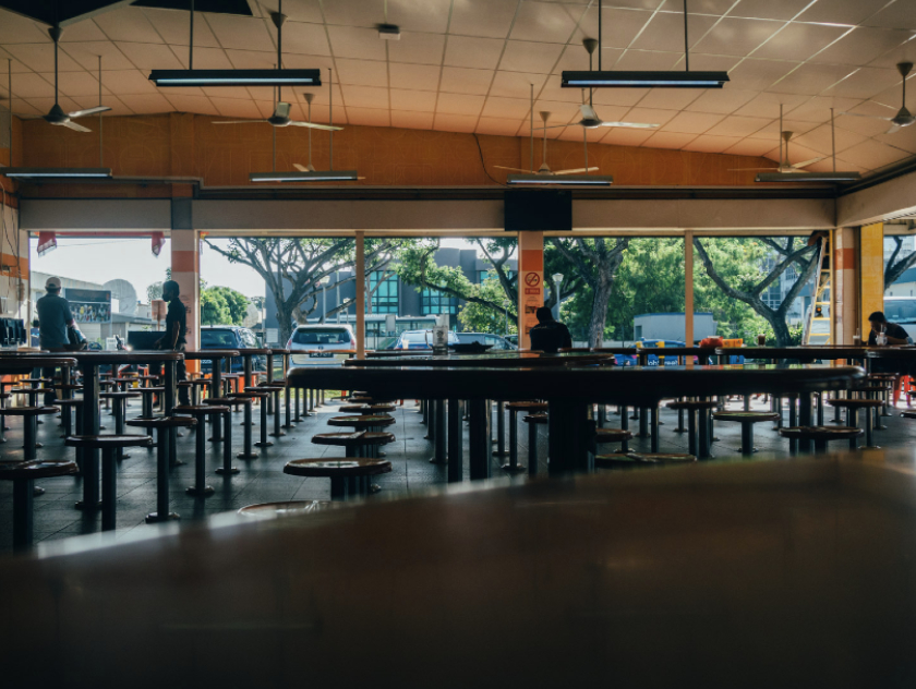 Winding down: a canteen empties out as the day draws to a close