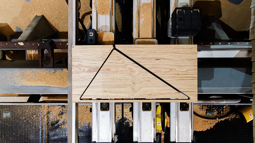 Machine cutting wood and timber at Superstructure High precision cutting of wood and timber is made possible by new technology