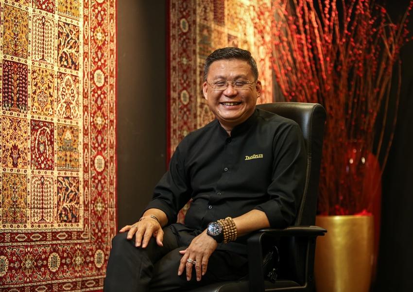Mr Nelson Lim, CEO of TranZplus Engineering, wants the company to have a trendier image so that they can attract younger talent. 