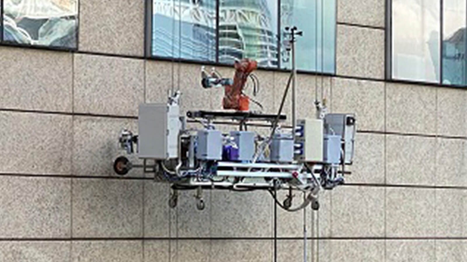 The AXIOBOTS in action at Centros @ Biopolis. Photo credit: Elid Technology International